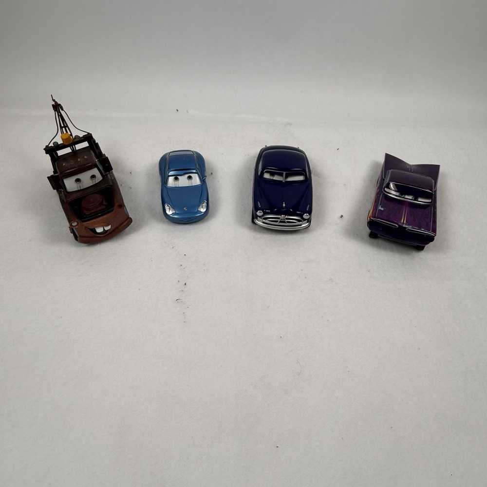 Disney Pixar Cars Lot of 4 Mater Sally Doc Hudson Ramone Diecast Vehicles